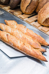 Craft bread on the table at the bakery. The concept of small industries and healthy food