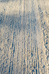 Tire tracks in the snow