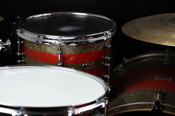 Closeup of drumsticks lying on the professional drum set. Drummer equipment. 