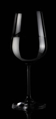 Wine glass. Dark background.