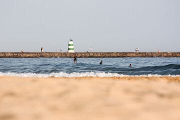 Lighthouse on the beach, Praia da Rocha, Algarve, Portugal