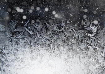 frost patterns on dark glass