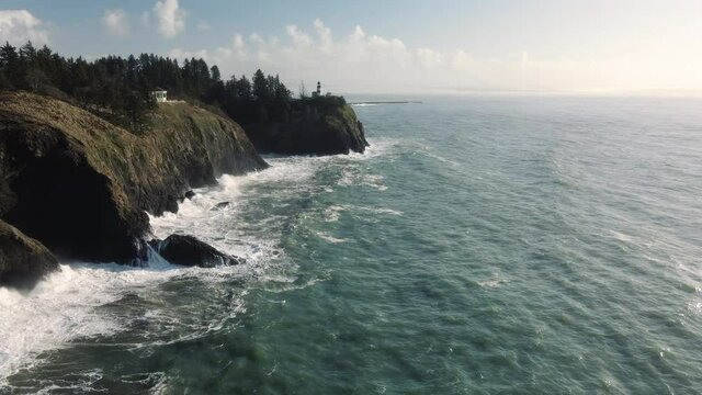 Drone Flight Up Washington Coast with King Tide Waves and Iconic Lighthouse