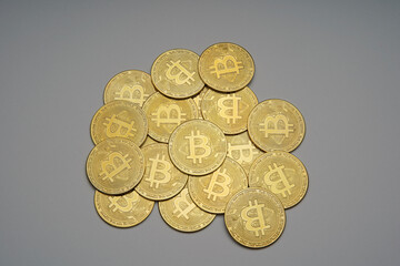 Stacked gold Bitcoin cryptocurrency (BTG). Coins on a dark background. Blockchain technology, Crypto currency, digital money.