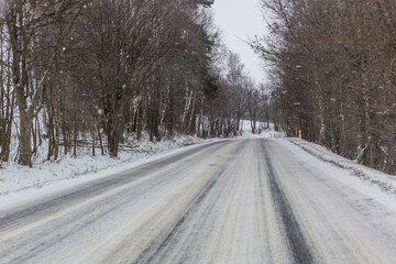 Winter view of I/11 road near Suchy vrch mountain, Czech Republic