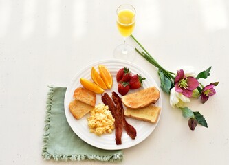 Tasty gourmet classic American style brunch breakfast for weekends and special occasions, Mother's Day, birthdays. Photo concept background, food, copy space
