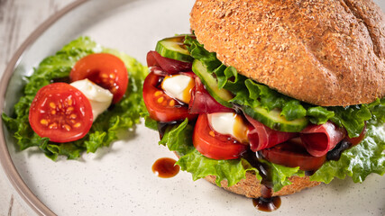 Sandwich with sliced dry-cured beef, cream cheese and vegetables, seasoned with soy sauce