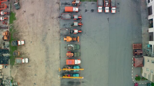 Special equipment, tractors, trucks are parked, top view