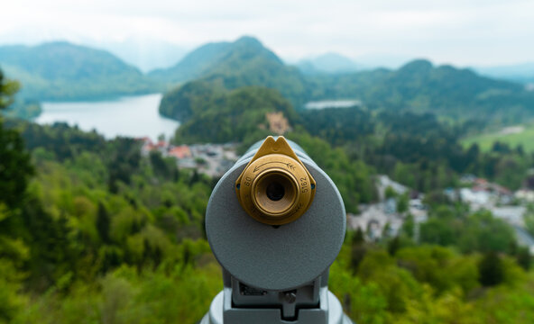 Binoculars looking out to beautiful mountains and lakes