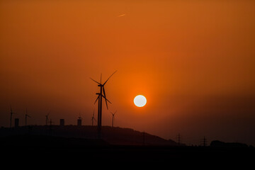 wind turbine at sunset
