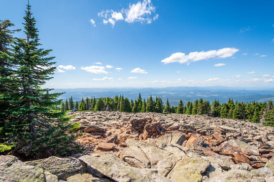 Views of the Spokane area from the top of Mt Spokane State Park, the highest point in Spokane County, with a rock formation built among the stones in Spokane, Washington, USA