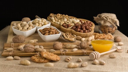 Different types of nuts, nuts in honey, nuts in slowmo, honey