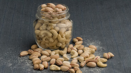 Different types of nuts, nuts in honey, nuts in slowmo, honey