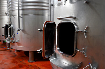 Industrial stainless steel vats in modern brewery. High quality photo.