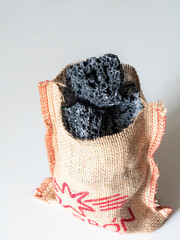 Sack full of lumps of sweet coal