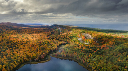Gorgeous streaming sun during autumn day at Lake of the Clouds at the Porcupine Mountains Wilderness State Park in the Michigan Upper Peninsula