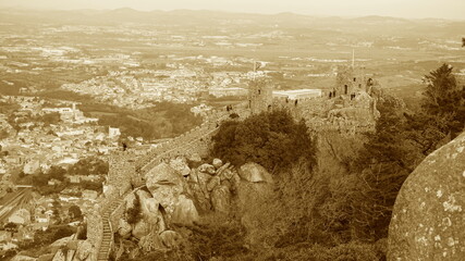 Obraz premium Lisbon, Portugal - The Castle of Sintra, popularly known as Castelo dos Mouros, is located in the village of Sintra, parish of São Pedro de Penaferrim, municipality of Sintra, in the district Lisbon