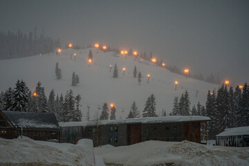 2021-02-14 SNOQUALMIE PASS SKI RESORT AT DAWN WITH LIGHTS ON