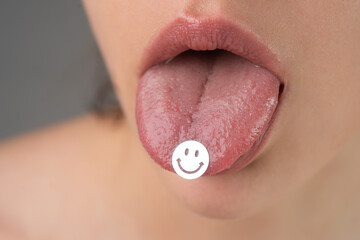 Drug addiction. Tongue with drugs. LSD. Psychedelic hallucinogens. - obrazy, fototapety, plakaty