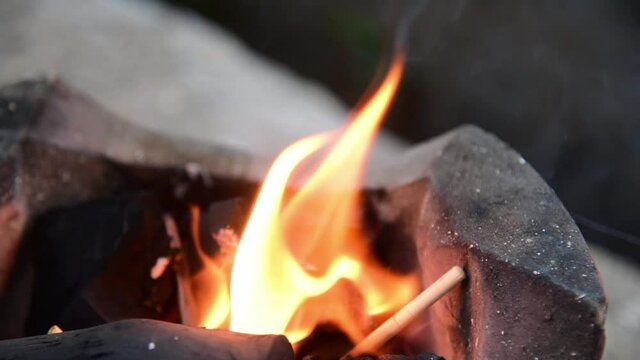 Fire on chaco with smoking.