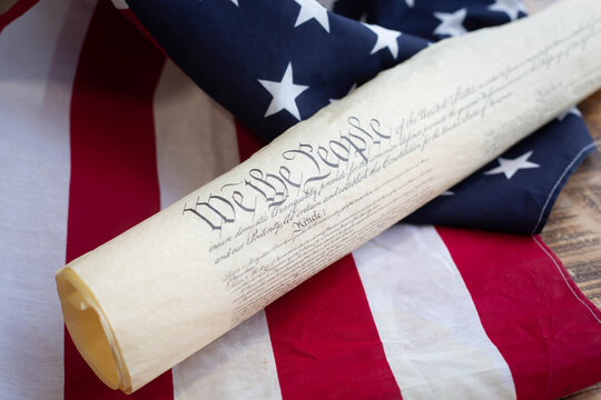 Constition of USA with US flag