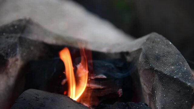 Fire on chaco with smoking.