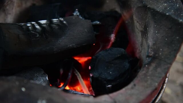 Fire on chaco with smoking.
