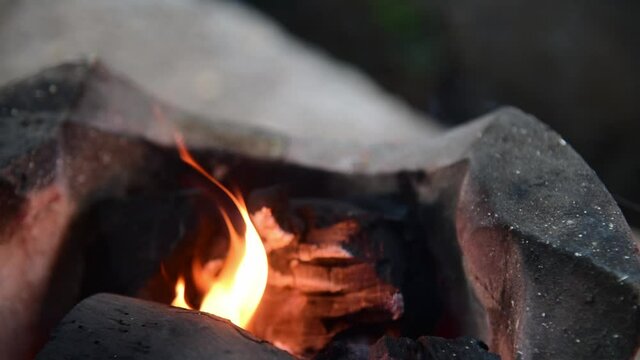 Fire on chaco with smoking.