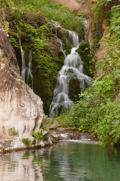 waterfall falls forming a small pool