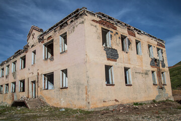 Fototapeta na wymiar Old ruined building, devastation and abandonment