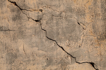 Old wall with a crack, rough background