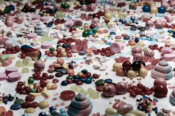 Chocolate coated and jelly beans candy mix. Big explosion of variety colour snack and sugar confetti. Festive dessert of different kinds of soft gummy, lollipop for holiday.