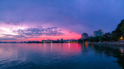 Naklejka premium sunset over the river