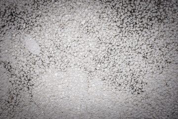 Details of the surface, a close-up shot, with a vignette on the cover and a bright dot in the center. Background or backdrop ideas.