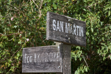 Wooden crossroads signs with street names 