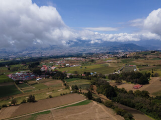 Fototapeta na wymiar Beautiful aerial view of the Meadow hills in Cartago Costa Rica 