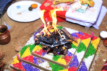 bonfire flame in indian traditional Hindu wedding selective focus