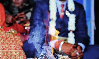 smoke of flame in Indian ritual or Indian wedding selective focus