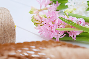 hyacinth flower on the table in florist shop. biodegradable natural packaging matherials. easter flowers. Hello spring concept