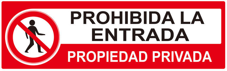 A sign that says  in Spain language :  no entry  PRIVATE PROPERTY.