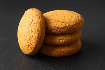 fresh oatmeal cookies on a stone background