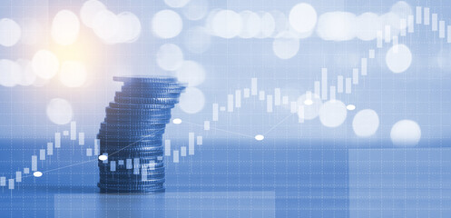 Close up of stacking of growth up coins with Double exposure of chart graph with night bokeh background for finance and business ,capital banking and investment ,stock market ,growth up concept.