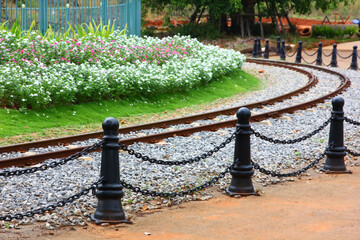 small raillway with beauty flower  in amusement park