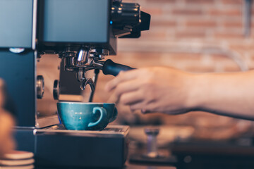 Barista cafe making coffee with coffee machine. Coffee preparation service concept.