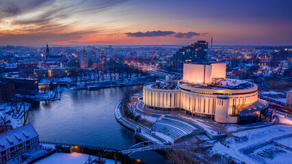 Stunning sunset over Opera Nova in winer Bydgoszcz, Poland