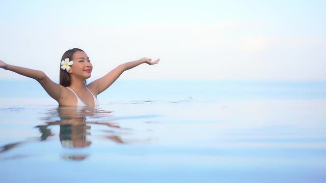 Beautiful Spiritual Woman in Swimming Pool, Reflection, Soft Focus.