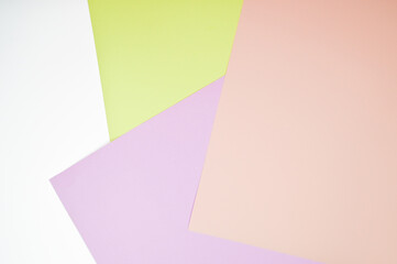 Abstract colored paper texture background. Minimal geometric shapes and lines in pastel pink, violet, pistachio-green and white colours