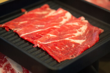 Premium Japanese wagyu beef sliced on plate for sukiyaki