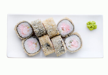 Japanese food restaurant delivery, sushi set . Sushi unagi, tempura rolls california with salmon, shrimp,  tuna, caviar and cheese isolated at white background. 