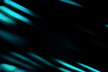 Blur colorful neon light leaks on black background. Defocused illuminated abstract futuristic texture for using over photos as overlay or screen filter